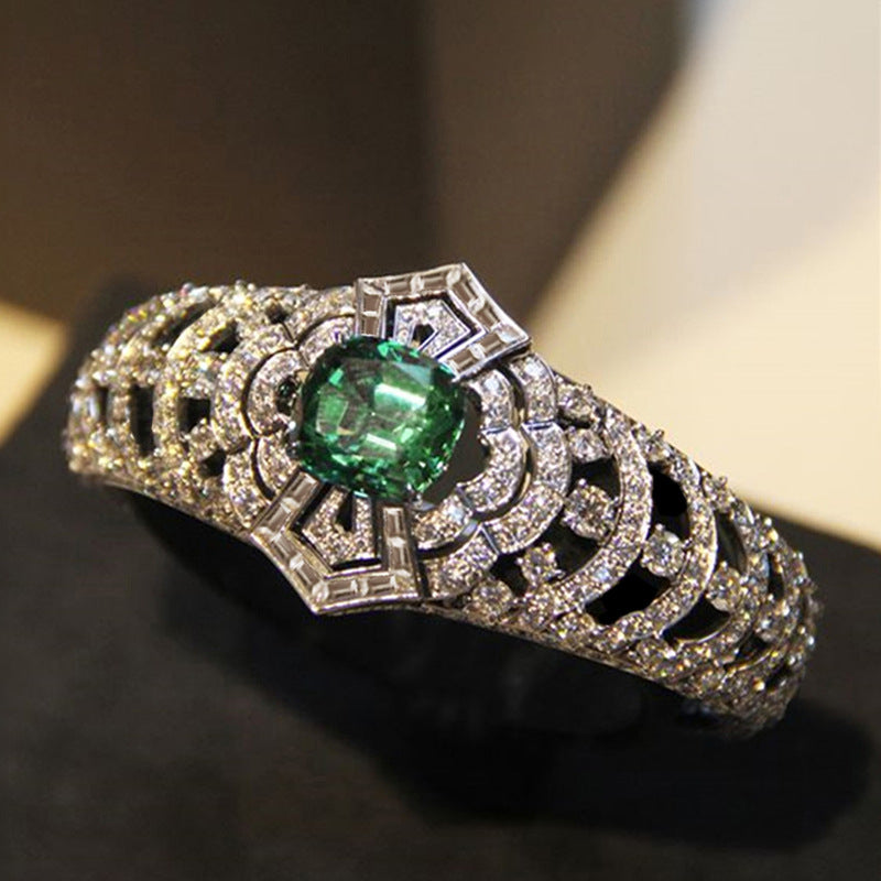 Art Deco -sormus smaragdilla